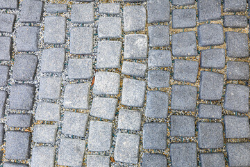 square stone pavement with gravel background.