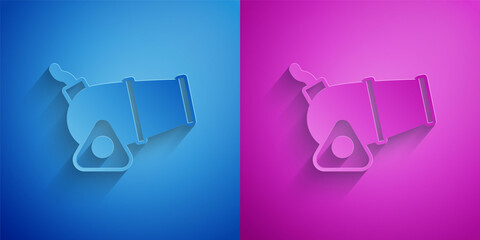 Paper cut Cannon icon isolated on blue and purple background. Medieval weapons. Paper art style. Vector