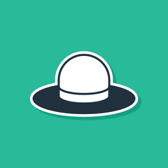 Blue Man hat with ribbon icon isolated on green background. Vector