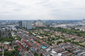 Fototapeta premium Aerial city view from flying drone at Nonthaburi, Thailand, top view of the city 