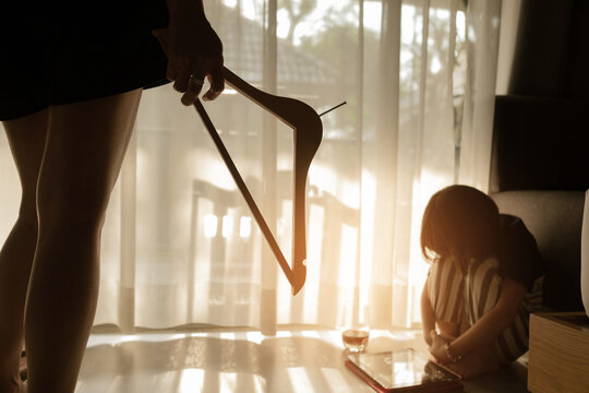 Mother Hit Her Kid, Children Crying, Feeling Sad, Family Violence Concept, Selective Focus And Soft Focus
