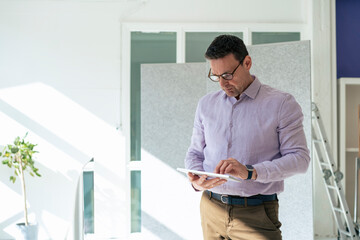 Businessman using wireless keyboard at office