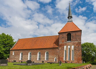 Fototapeta na wymiar Die evangelisch-reformierte Kirche in Rysum; Ostfriesland; Deutschland