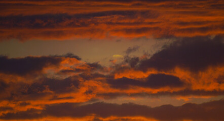The clouds turned reddish
