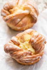 French pastry with vanilla cream and icing 