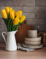 Beautiful tulip flowers  on table at kitchen