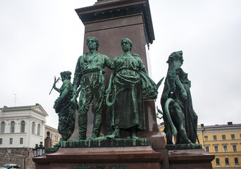 Fototapeta na wymiar Sculptural group of Alexander II Monument (1894) on Senate Square in Helsinki, Finland