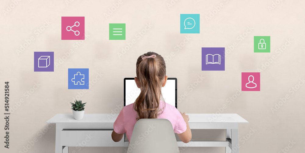 Poster Girl surfs the internet on a laptop computer. The concept of using a computer for communication with friends, learning and safety on the Internet with hovering icons overhead
