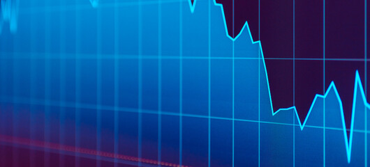 Daily trading prices on the online stock market graph showing on color screen.Daily investor's business everyday life.Banner,selective focus.