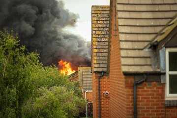 House roof on fire in england uk © Jevanto Protography