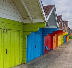 close-up view of colorful wooden beach huts on the beach of Scarborough in North Yorkshire