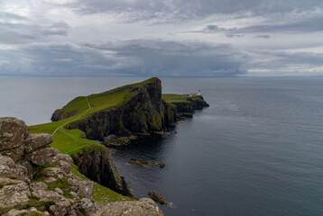 Fototapeta na wymiar view of Neist Point on the Minch and the lighthouse on the cliffs
