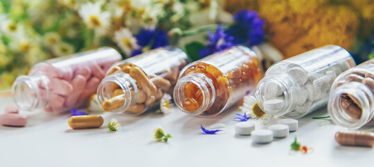 Homeopathy and dietary supplements from medicinal herbs. Selective focus.