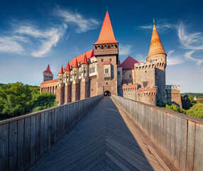 Incredible summer view of Hunyad Castle (Corvin's Castle). Wonderful summer scene of Hunedoara, Transylvania, Romania. Romanian castle landmarks. © Andrew Mayovskyy