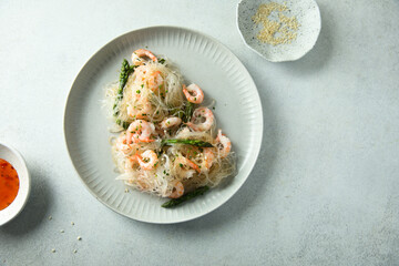 Rice noodles with shrimps and asparagus