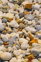 海岸沿いの小石の背景素材