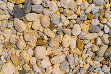 海岸沿いの小石の背景素材