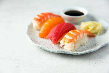 Assorted sushi with ginger and soy sauce