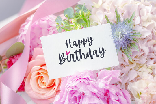 Happy birthday card on beautiful flower bouquet background