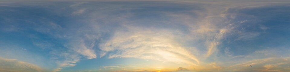 Naklejka na ściany i meble Bright sunset sky panorama with Cirrus clouds. Hdr seamless spherical equirectangular 360 panorama. Sky dome or zenith for 3D visualization, game and sky replacement for aerial drone 360 panoramas.