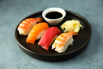 Assorted sushi with ginger and soy sauce