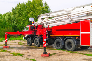 Fototapeta premium Fire truck for extinguishing tanks with air-mechanical foam. A fire truck for extinguishing tanks with flammable liquids. Fire truck for extinguishing large fires at oil refining plants.