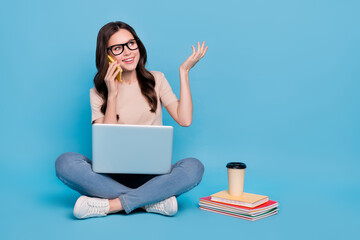 Photo of lady promoter use netbook speak gadget client about college discounts isolated blue color background