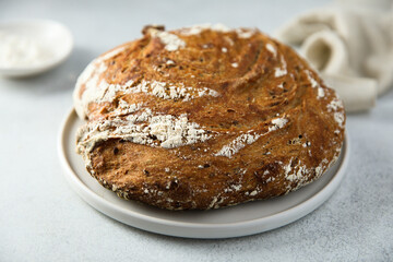 Fototapeta na wymiar Organic artisan bread on a plate