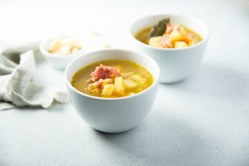 Homemade pea soup with smoked bacon