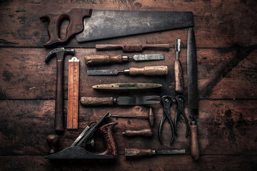 collection of old carpentry tools illustrating craftsmanship concept
