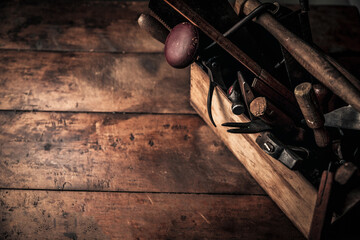 wooden box of carpentry tools on workbench