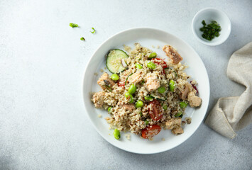Quinoa bowl with salmon and edamame