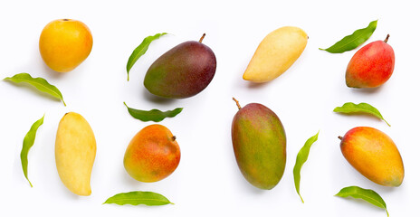Tropical fruit, Frame made of mango with leaves on white background. Copy space