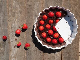 Delicious chocolate cake with strawberries