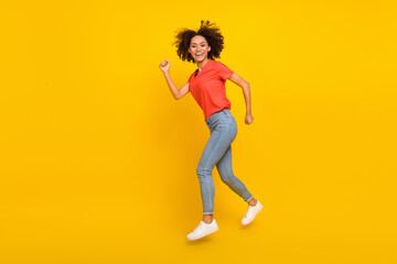 Fototapeta na wymiar Full size profile photo of excited energetic person running hurry fast isolated on yellow color background