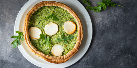 green savory pie spinach tart cheese fresh healthy meal food snack on the table copy space food background