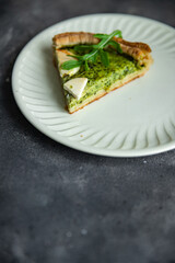 green savory pie spinach tart cheese fresh healthy meal food snack on the table copy space food background