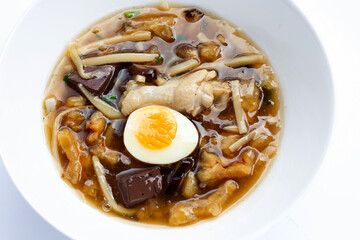 Fish maw soup on white background.