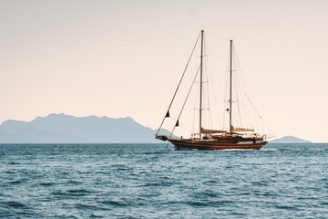 Fototapeta na wymiar Sailing boat in Aegean sea landscape travel yachting tour cruise beautiful scenery