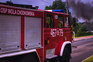 car on fire, rescue operation of the fire brigade