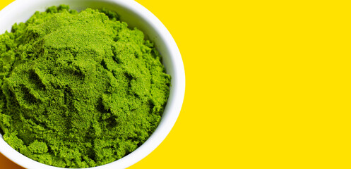 Wolffia globosa or Water Meal on yellow background.