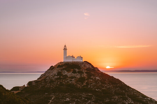 Sunset landscape lighthouse on the hill above Aegean sea in Turkey travel destinations Knidos landmark