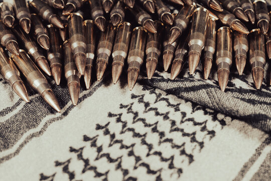 .308 caliber ammunition on a fabric background (keffiyeh)