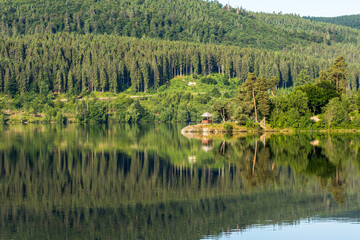 Schluchsee in the Black Forest, water reflection, view of the pavilion of the Amalienruhe, Baden-Wuerttemberg, Germany