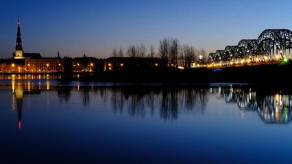 Fototapeta na wymiar Spring sunrise in old Riga over the Daugava