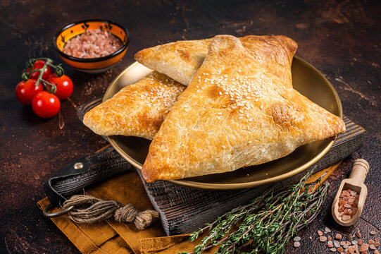 Samsa With Chicken And Cheese, Samosa Oriental Pies. Dark Background. Top View