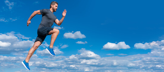 Fototapeta na wymiar Man running and jumping, banner with copy space. energetic man athlete with muscular body run in sportswear outdoor on sky background, motivation.