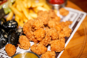 A Crispy and Delicious Chicken Popcorn and Cuttlefish Fried Platter