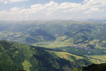 Fototapeta premium The view from Imbachhorn mountain to Zell am See valley, Austria 