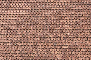 An old roof covered with ceramics tiles in Europe